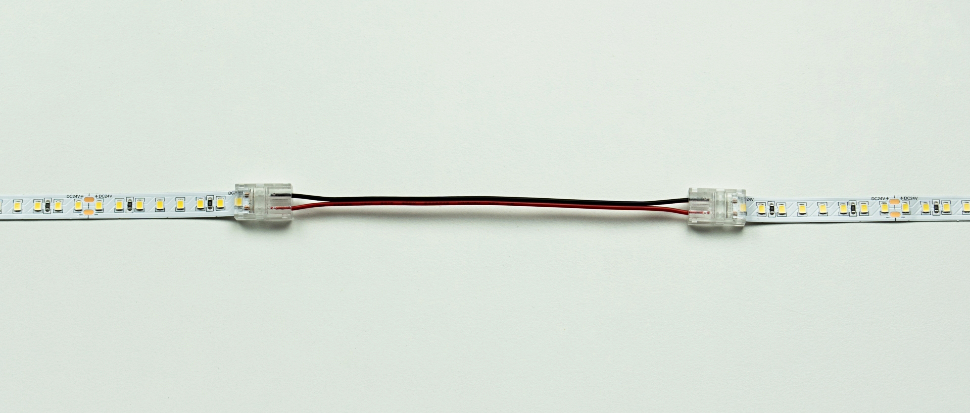 Connection diagram of LED strips using a double-sided connector with a cable